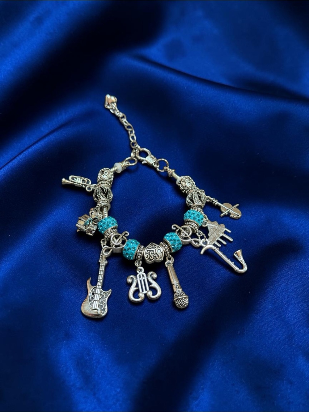 Silver-Tone Music Charm Bracelet with Turquoise Beads